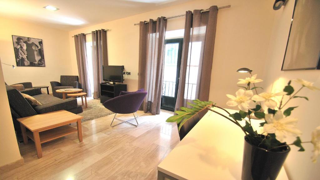 Apartamentos Living Sevilla Centro Maestranza Sevilha Quarto foto
